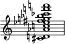 {
\override Score.TimeSignature #'stencil = ##f
\relative c' {
\clef treble \time 4/4
<cis d! aes' c! es fis g! bes ces f! a!>1
} }