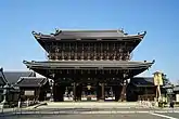 Founder's Hall Gate (Goei-do Mon), built in 1911, width 31&nbsp;m (103&nbsp;ft) x height 27&nbsp;m (90&nbsp;ft), 59,387 roof tiles