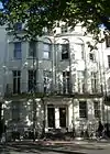 19 Grand Parade, Brighton (right), Pike's early 20th-century residence and business address