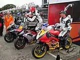 Winners Presentation 2012 Senior Manx Grand Prix – Andrew Soar (43) 750&nbsp;cc Suzuki, John Simpson (31) 675&nbsp;cc Triumph & Wayne Kirwan (4) 600&nbsp;cc Yamaha TT Grandstand Friday 31 August 2012