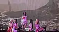 (G)I-dle in floral dresses incorporated with traditional Korean folk motif outfits for the theme a tragic HEROiNE.