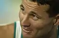 Close up of Elgin looking upwards during track competition at the 2000 Summer Paralympics