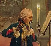 Portrait of man playing the flute