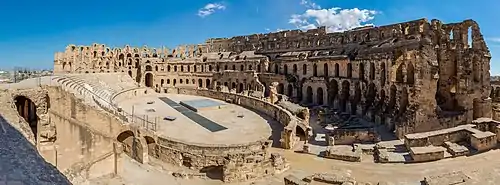 Image 10Amphitheatre of El JemPhotograph: Poco a pocoPanoramic view of the Amphitheatre of El Jem, an archeological site in the city of El Djem, Tunisia. The amphitheatre, one of the best-preserved Roman ruins and a UNESCO World Heritage Site since 1979, was built around 238 AD, when modern Tunisia belonged to the Roman province of Africa. It is the third-biggest amphitheatre in the world, with axes of 148&nbsp;m (486&nbsp;ft) and 122&nbsp;m (400&nbsp;ft) and a seating capacity of 35,000, unique in Africa.More selected pictures