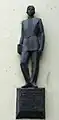 Anton Chekhov statue at the entrance of the gymnasium.