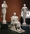 Sculpture group with a man seated in a klismos at the Getty Museum