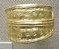 Finger ring with punched decoration