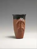 Black-topped red ware jar with a climbing animal, Metropolitan Museum of Art