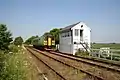 Blotoft signal box (Helpringham)with a Class 153 unit passing.[page&nbsp;needed]