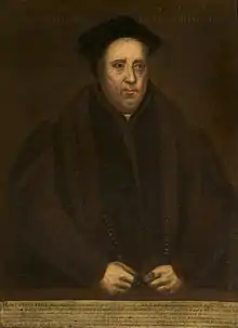 A Tudor statesman in his chains of office and gown