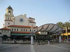 The back of the theater, featuring an entertainment stage where the show takes place.