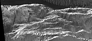 Light toned mound as seen by HiRISE under the HiWish program.  The mound probably contains water bearing minerals.