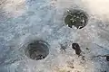 close up of grinding holes