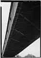 (image 7 of 9)1984Underside showing – from the bottom up – the lower lateral braces attached to the floor joists that support the floor planks.