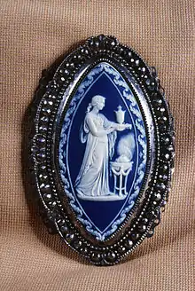Belt clasp designed by Lady Templeton and Emma Crewe for Josiah Wedgwood's factory.  Jasperware, steel, tin. The Walters Art Museum