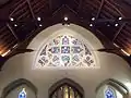 Window above the entrance at the rear of the chapel