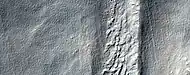 Close, color view of flow, as seen by HiRISE under HiWish program Patterned ground is visible in the photo.