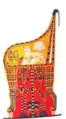 Egyptian Armchair with a cushion hanging over its back