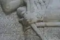 Close-up of the left hand holding the mace