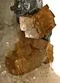 Siderite crystals with galena and quartz. Size: 6.2&nbsp;cm ×&nbsp;4.1&nbsp;cm ×&nbsp;3.6&nbsp;cm (2.4&nbsp;in ×&nbsp;1.6&nbsp;in ×&nbsp;1.4&nbsp;in).