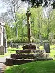 Churchyard cross immediately south of Holy Ghost Church