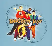 The band is posing in front of a light blue background. The song title is written in a circular shape placed directly behind them.