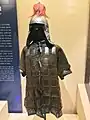 Mail and plate armour and helmet.