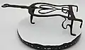 Heart trivet with three legs