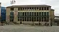 Bavarian State Bank head office on the same location, designed after World War II by Sep Ruf and repurposed in the 2010s for the Bavarian Finance Ministry&nbsp;[de]