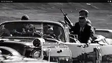 Secret Service agent George W. Hickey with an ArmaLite AR-15 Model 01 moments after President Kennedy was shot in Dallas on November 22, 1963