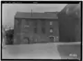 A 1934 view of the now-demolished grinding mill that stood roughly where the World War II memorial just to the northwest of where the Hyatt Regency is today