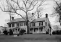 The parsonage house and academy building in 1937