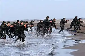 IRGCN frogmen mostly equipped with Z-84 submachine guns in an amphibious exercise of Great Prophet IX war games exercise