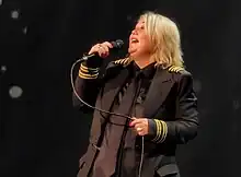 Arden performing in 2023