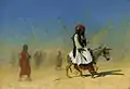 An Albanian on his donkey crossing the desert, unknown date.
