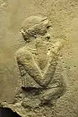 Detail of a limestone votive monument from Sippar, Iraq, dating to c. 1792&nbsp;– c. 1750 BC showing King Hammurabi raising his right arm in worship, now held in the British Museum