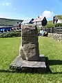 Memorial in memory of the writer Martin Joensen who was born in Sandvík in 1902.