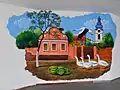 Mural in the Cultural Center, a gift from famous naive painters from Kovačica
