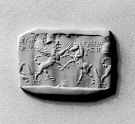Impression in clay of "horizontal cuneiform" (requiring a reversed cuneiform 'stencil' form on cylinder seal).