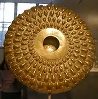 Gold phiale with repoussé bees, acorns, and beechnuts and Greek and Punic inscription (4th–3rd century BC, Met)