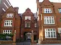 Minor Canonries, Amen Court, City of London, showing the entrance front towards Warwick Lane, 1878–80 by Ewan Christian