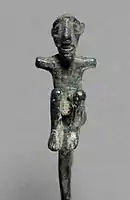 Human on pin head