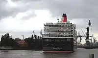 The Azipod system holds the ship in position against a wind from the north-east.