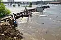 Debris piled up on the Victoria Bridge in Minot