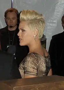 A woman with short blond hair