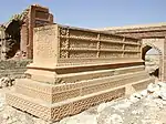 Quranic artwork at a decorated grave of a Sufi saint in the necropolis