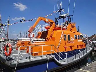 Stern quarter showing crane and inflatable boat stowed
