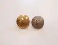 ROC metal tunic buttons, (Gilt Officer's button 3&nbsp;mm larger in diameter), depicting the Elizabethan coast watcher emblem.