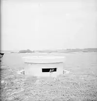 The turret of a Pickett-Hamilton fort, fully raised and manned during the Second World War.