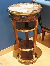 Neoclassical bucrania on a gueridon (small high table) from the salon of madame Récamier, c.1790, mahogany, gilt bronze and marble, Louvre